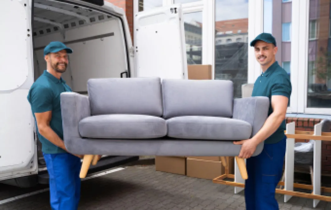 Sofa and household furniture ready to load into a removal van